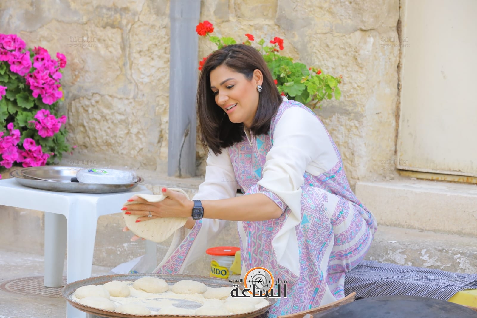 Madar Al-Saa Images 0.1819814595617002