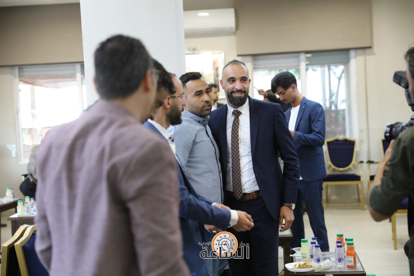 Madar Al-Saa Images 0.8289707321638748