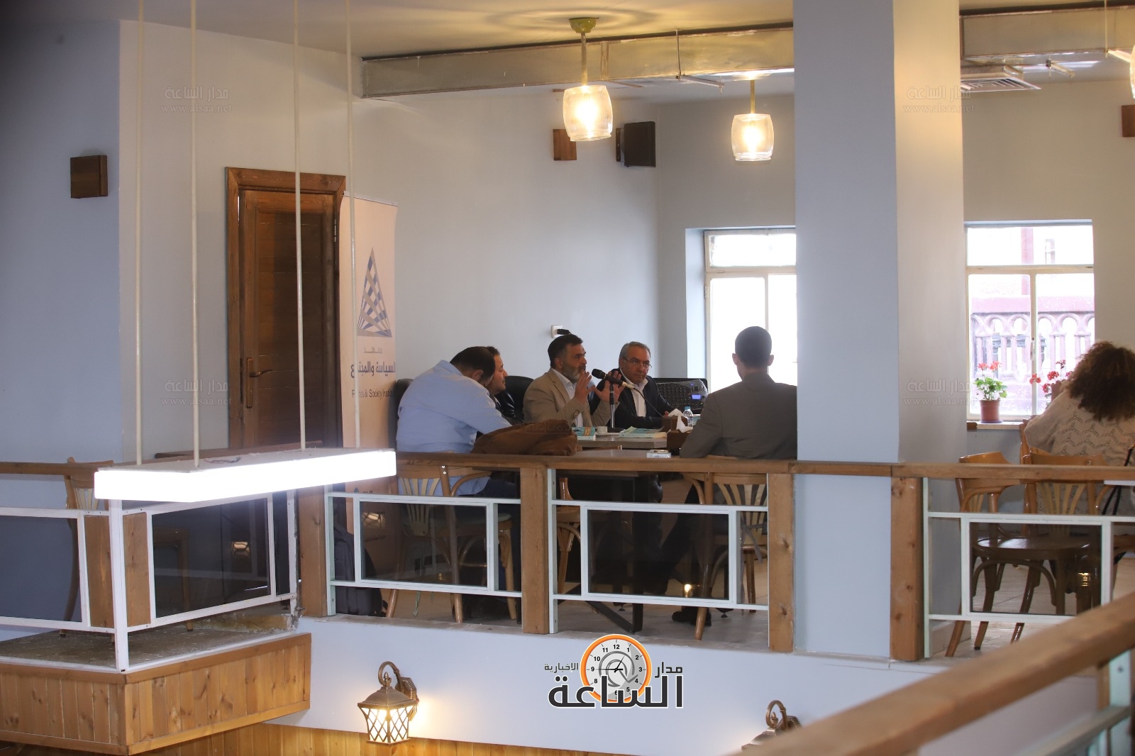 Madar Al-Saa Images 0.7153125452649338