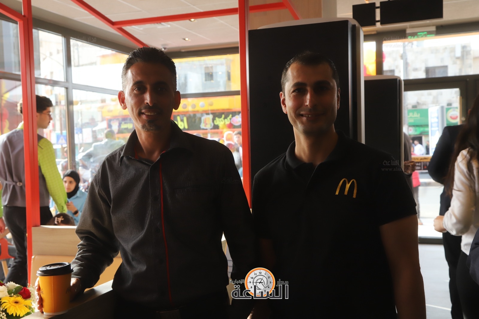 Madar Al-Saa Images 0.0894614316757838