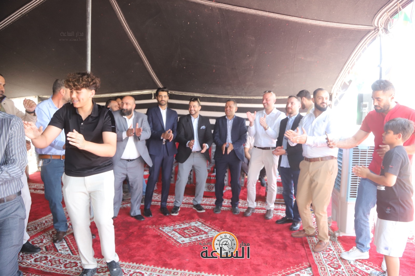 Madar Al-Saa Images 0.3877057845608578