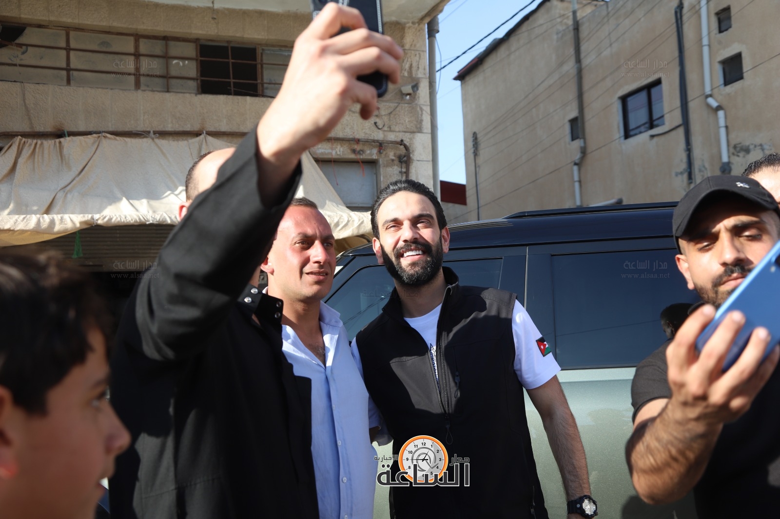 Madar Al-Saa Images 0.34447193824219413