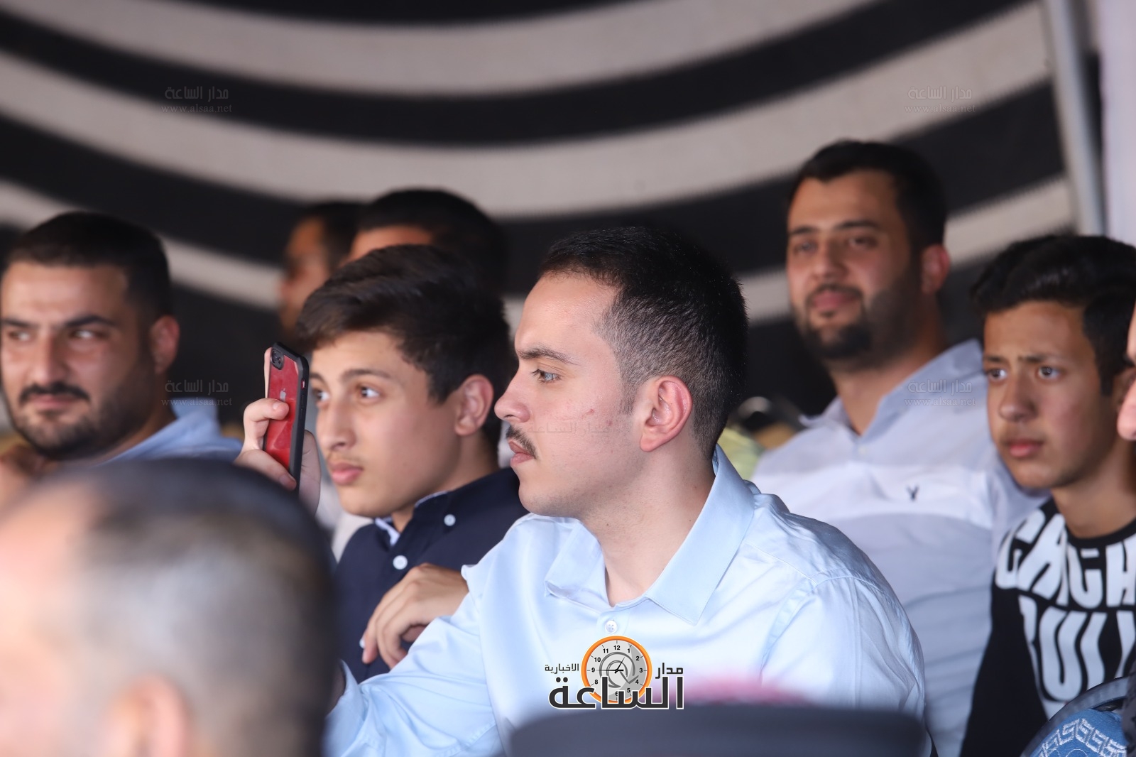 Madar Al-Saa Images 0.18289318155183842