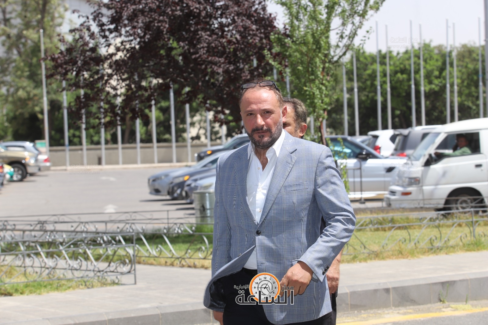 Madar Al-Saa Images 0.7584113446337444