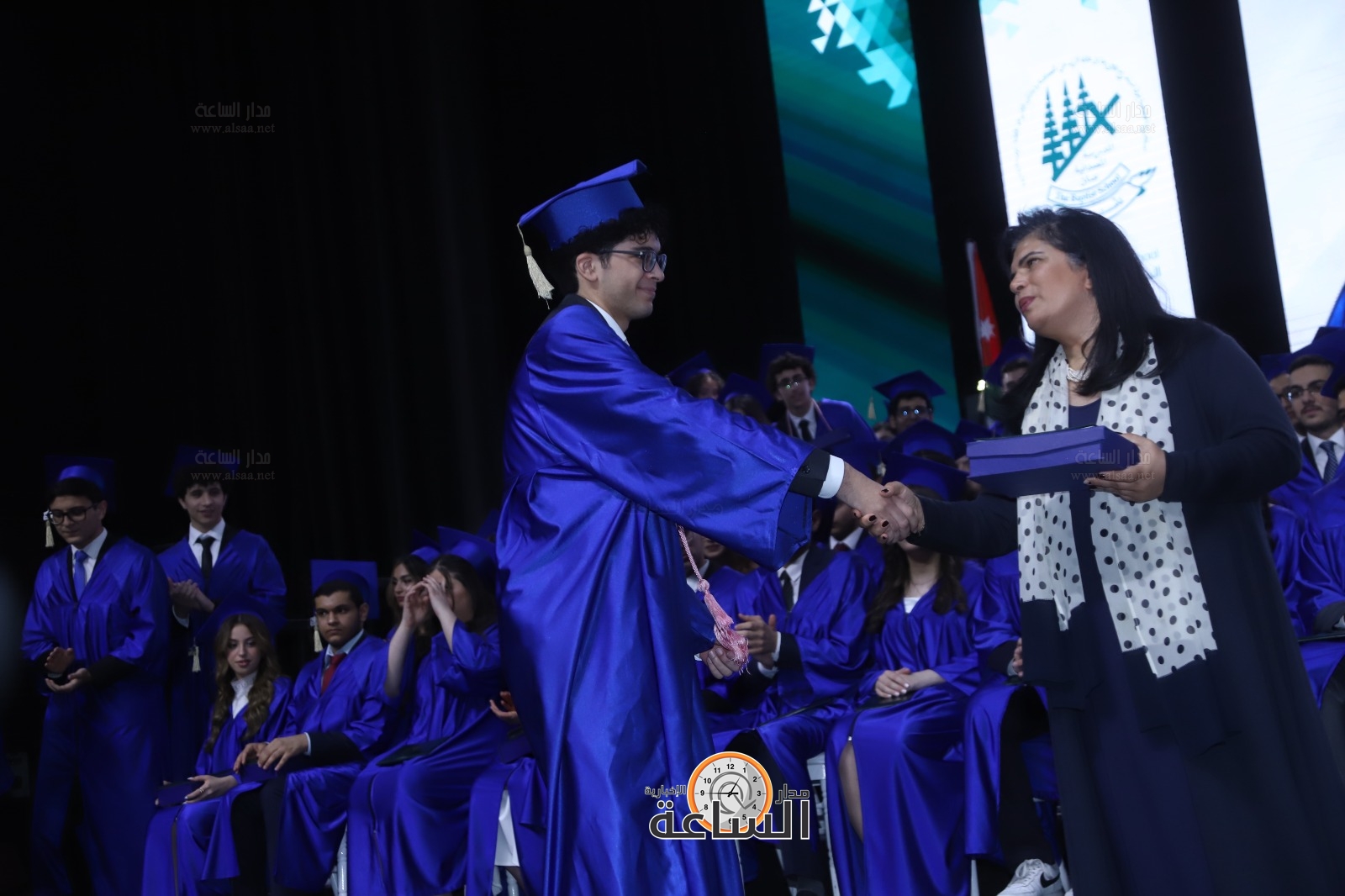 Madar Al-Saa Images 0.9870342502837679