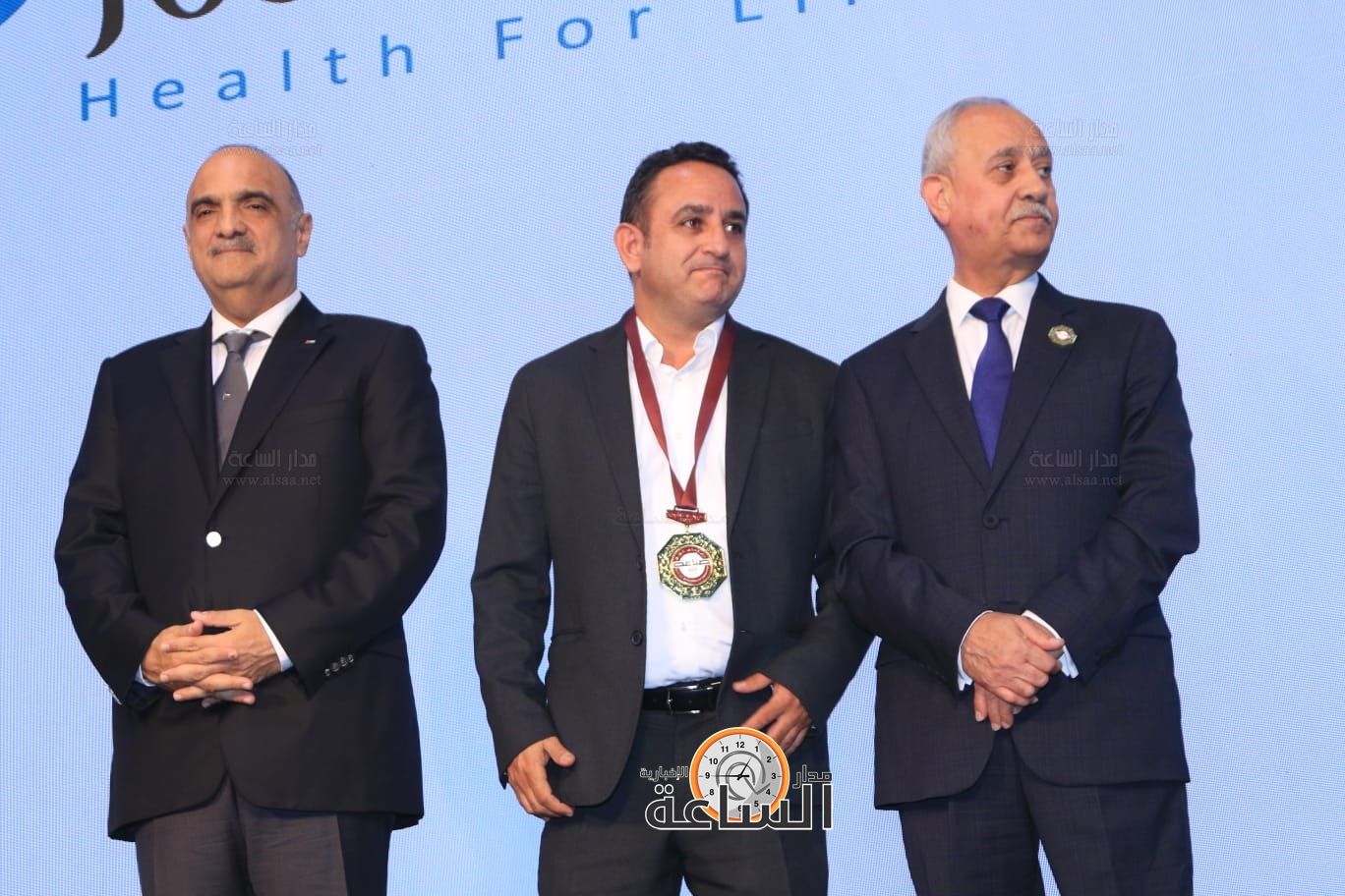 Madar Al-Saa Images 0.3338028675653033