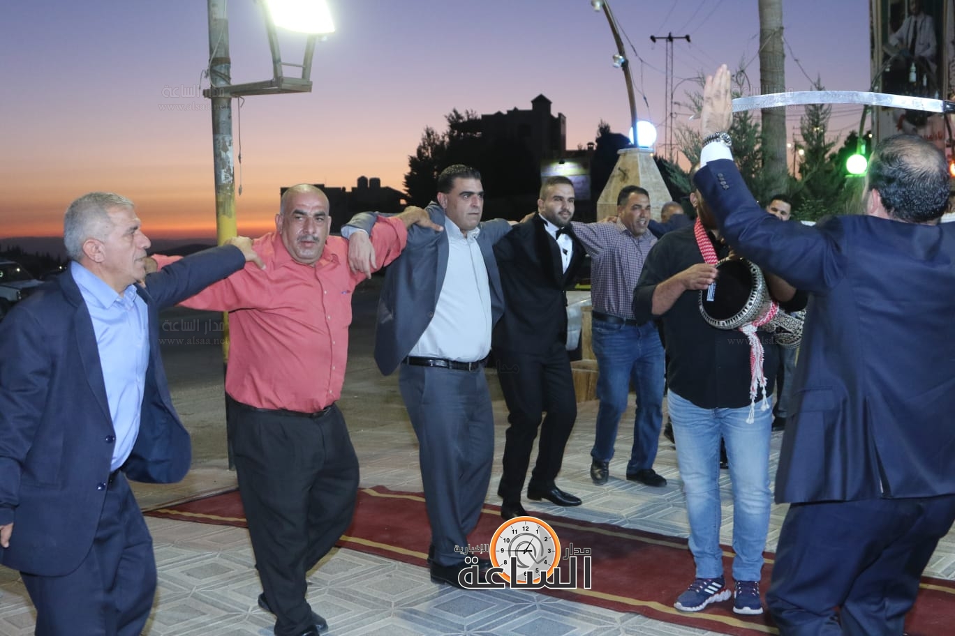 Madar Al-Saa Images 0.6001999519347168