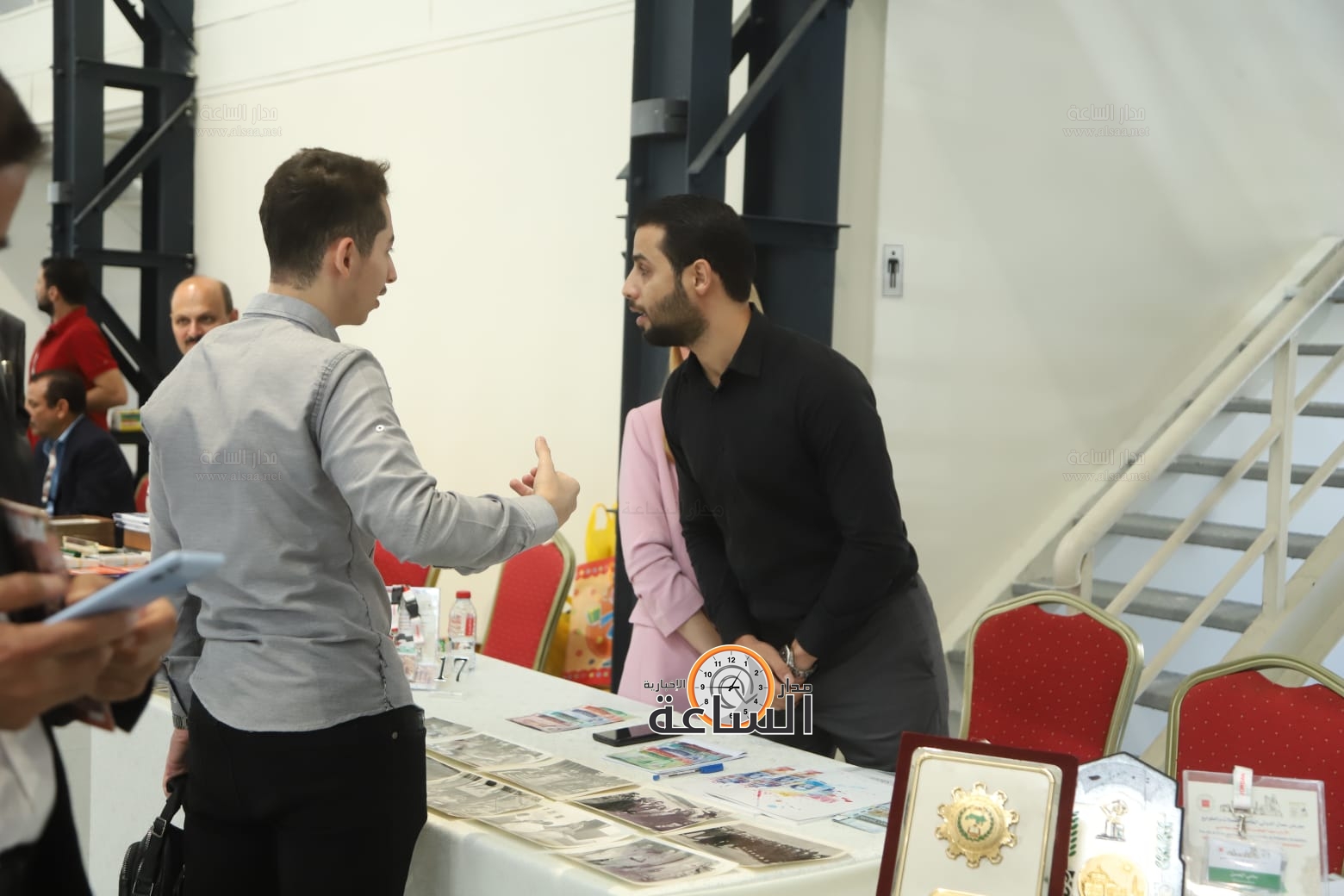 Madar Al-Saa Images 0.673512603566496