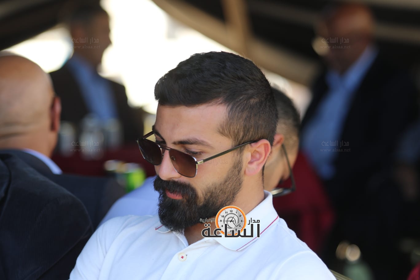 Madar Al-Saa Images 0.7142215542369312