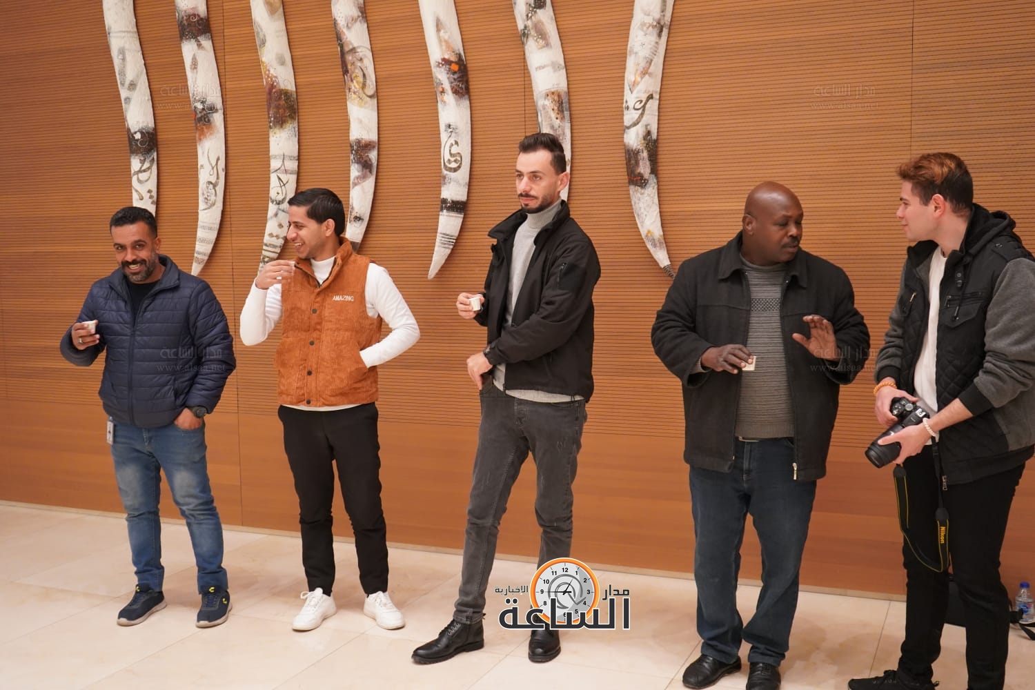 Madar Al-Saa Images 0.7932119610429538