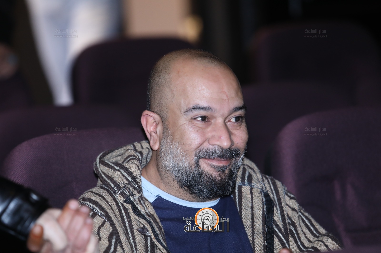 Madar Al-Saa Images 0.7476764485457887