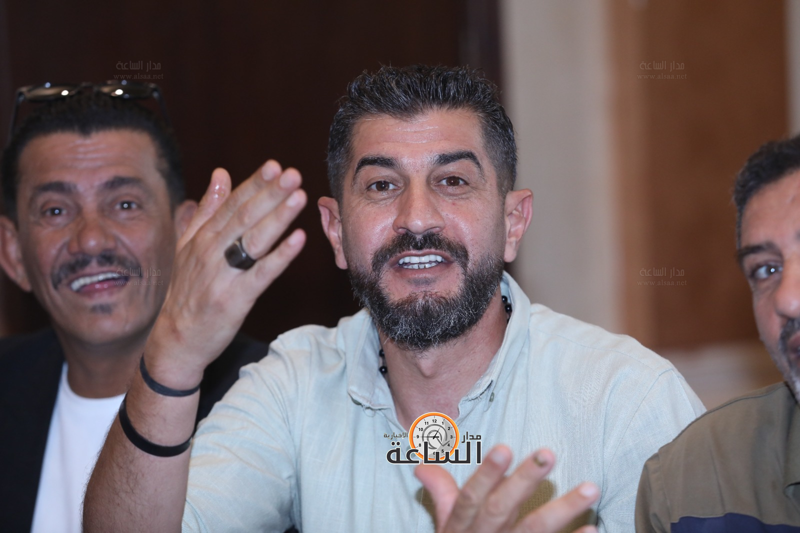 Madar Al-Saa Images 0.6215397232623427