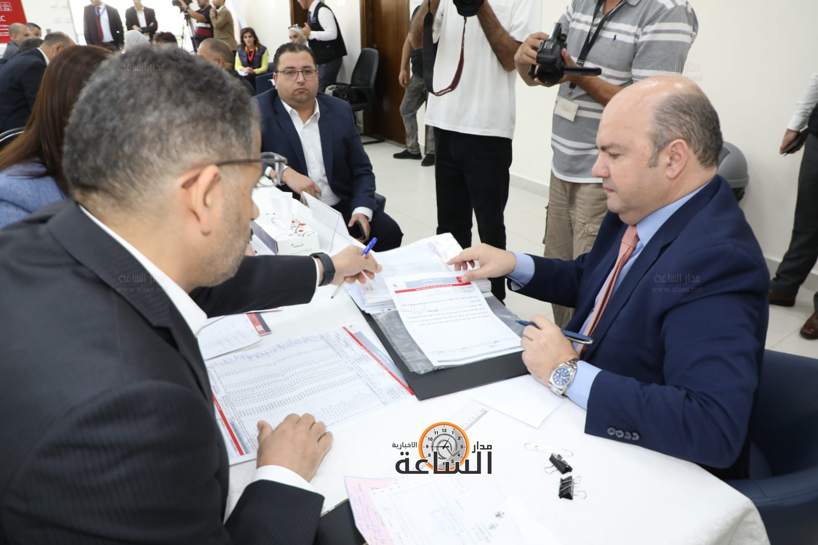 Madar Al-Saa Images 0.7969743679613122