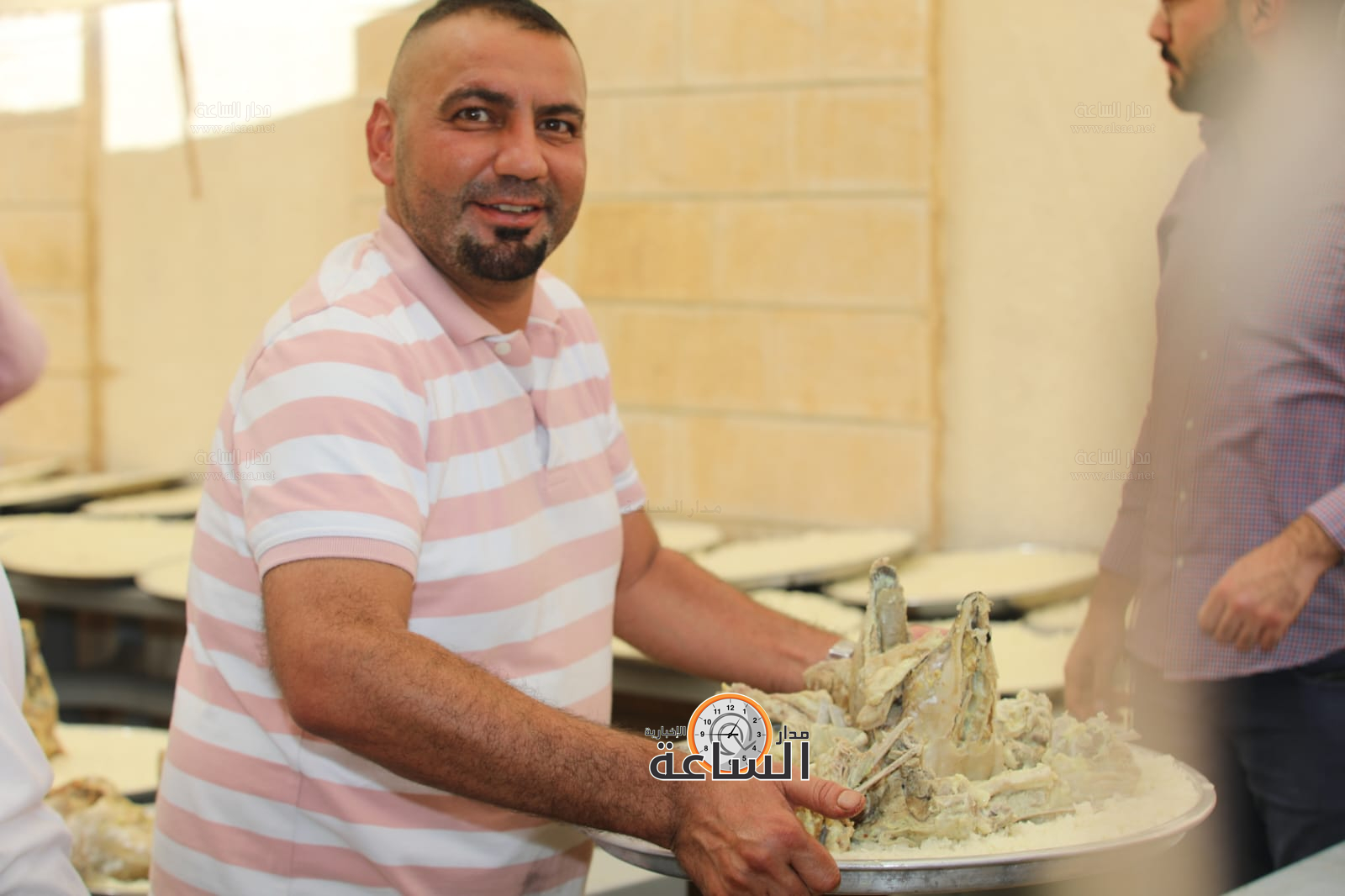 Madar Al-Saa Images 0.6931769298605974