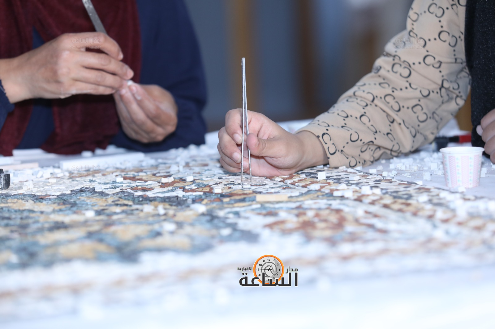 Madar Al-Saa Images 0.1468612833796601