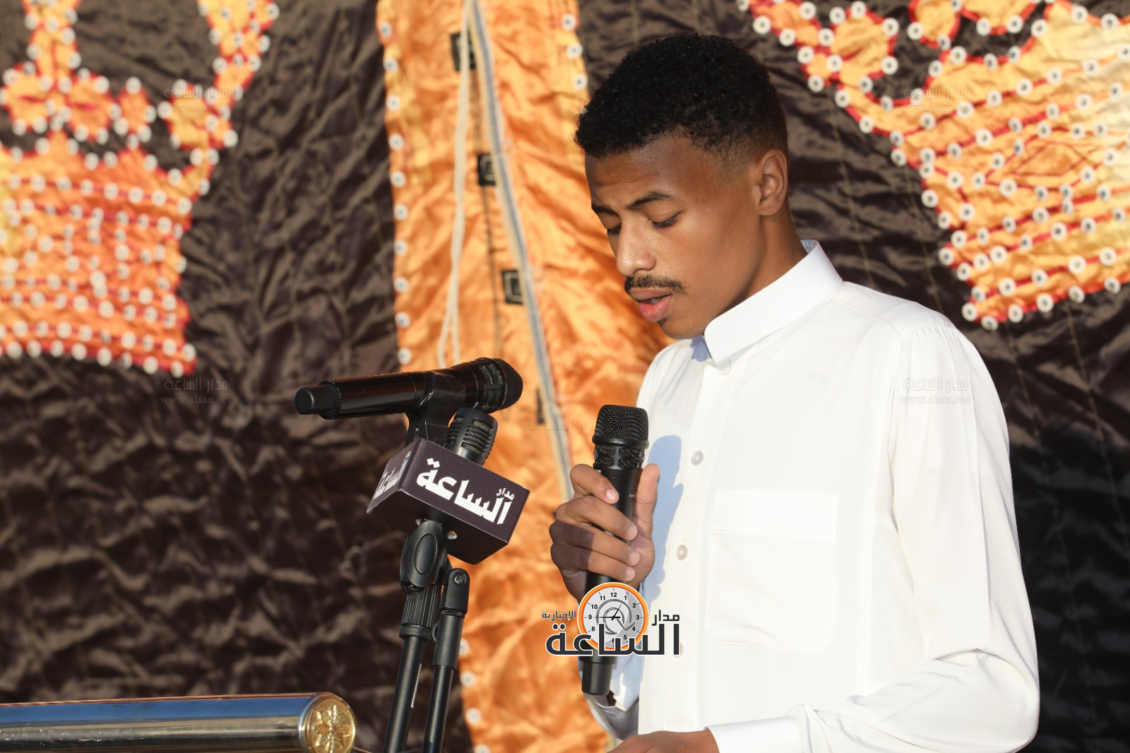 Madar Al-Saa Images 0.5641572588146171