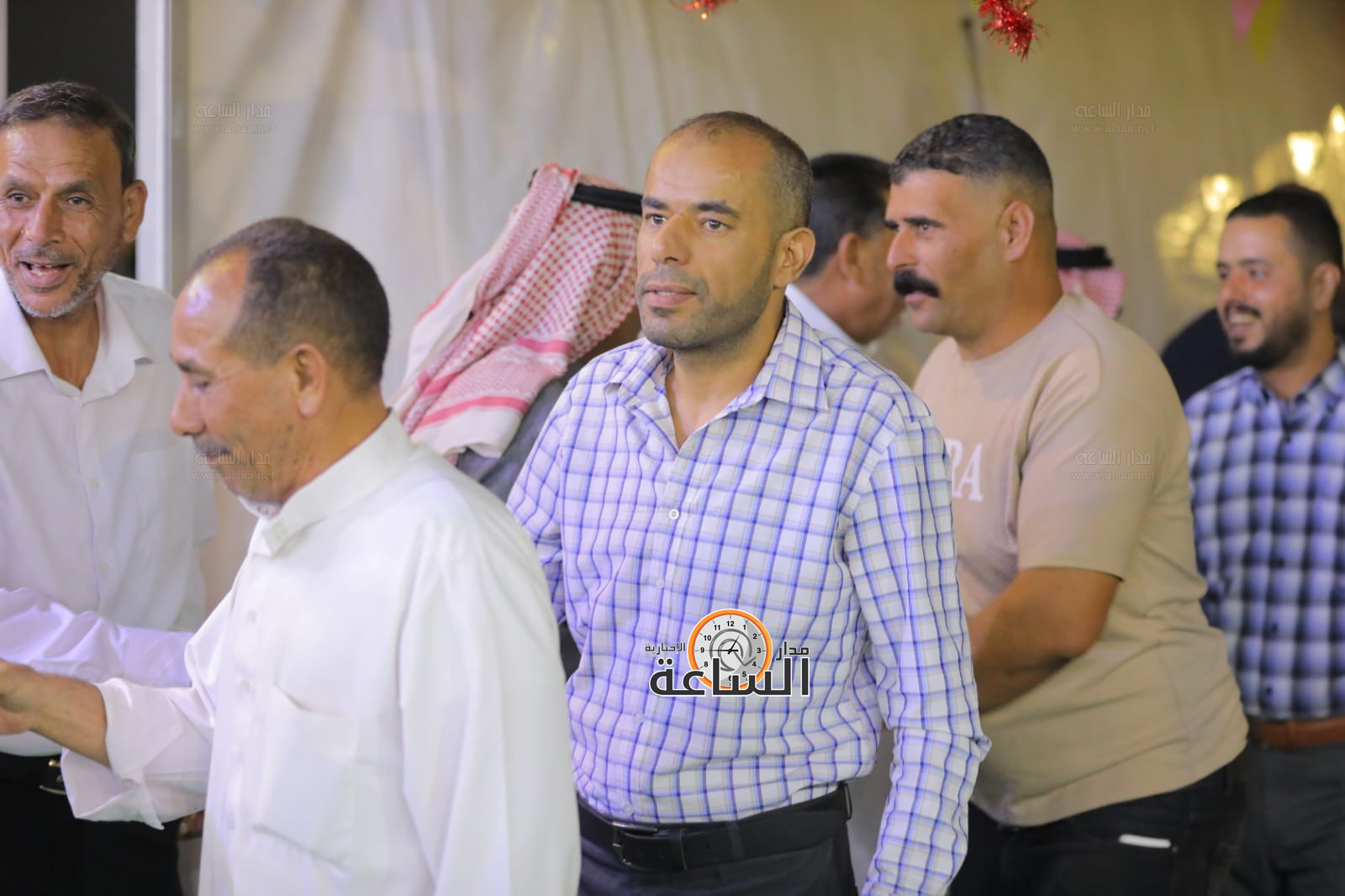 Madar Al-Saa Images 0.7918102117521213