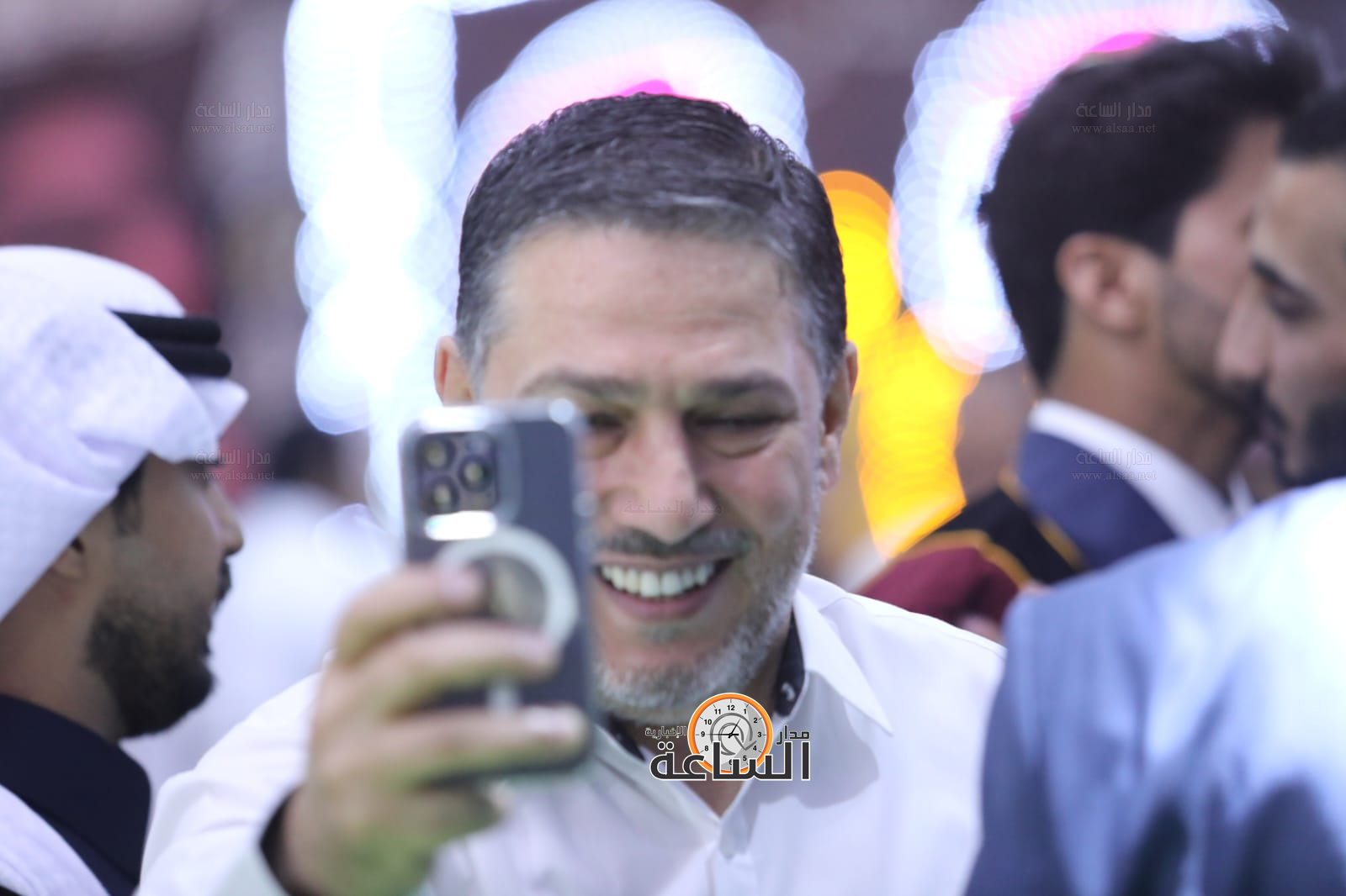 Madar Al-Saa Images 0.8554423556812234