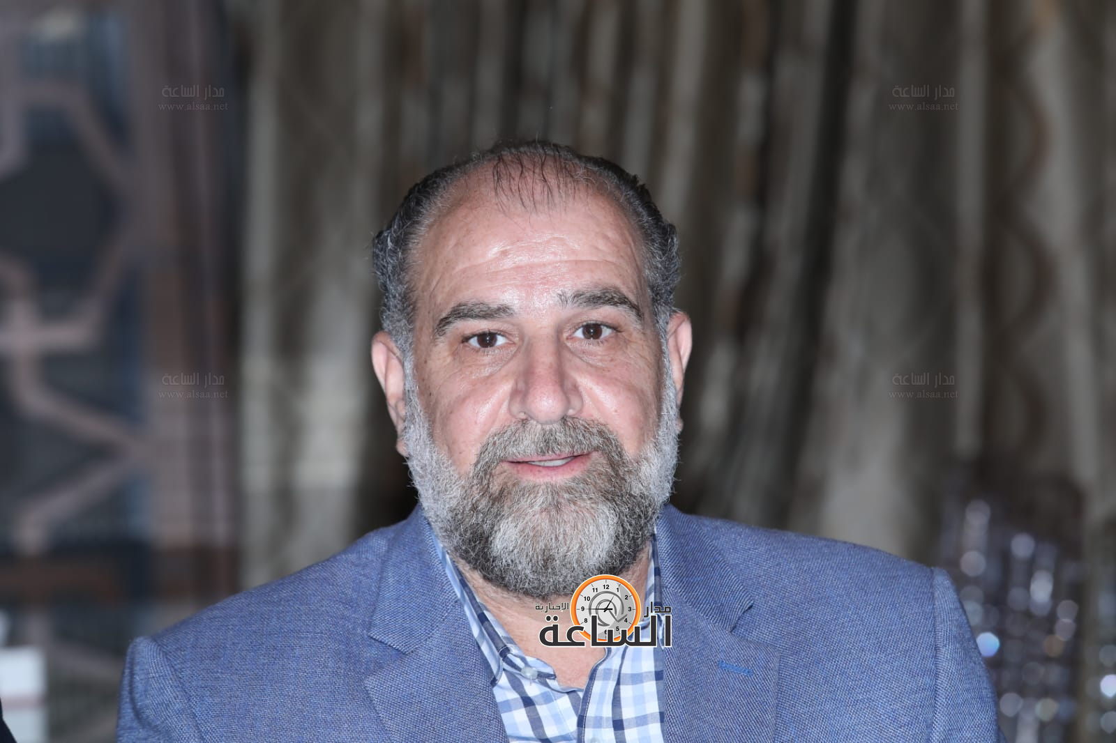 Madar Al-Saa Images 0.6529411906040536