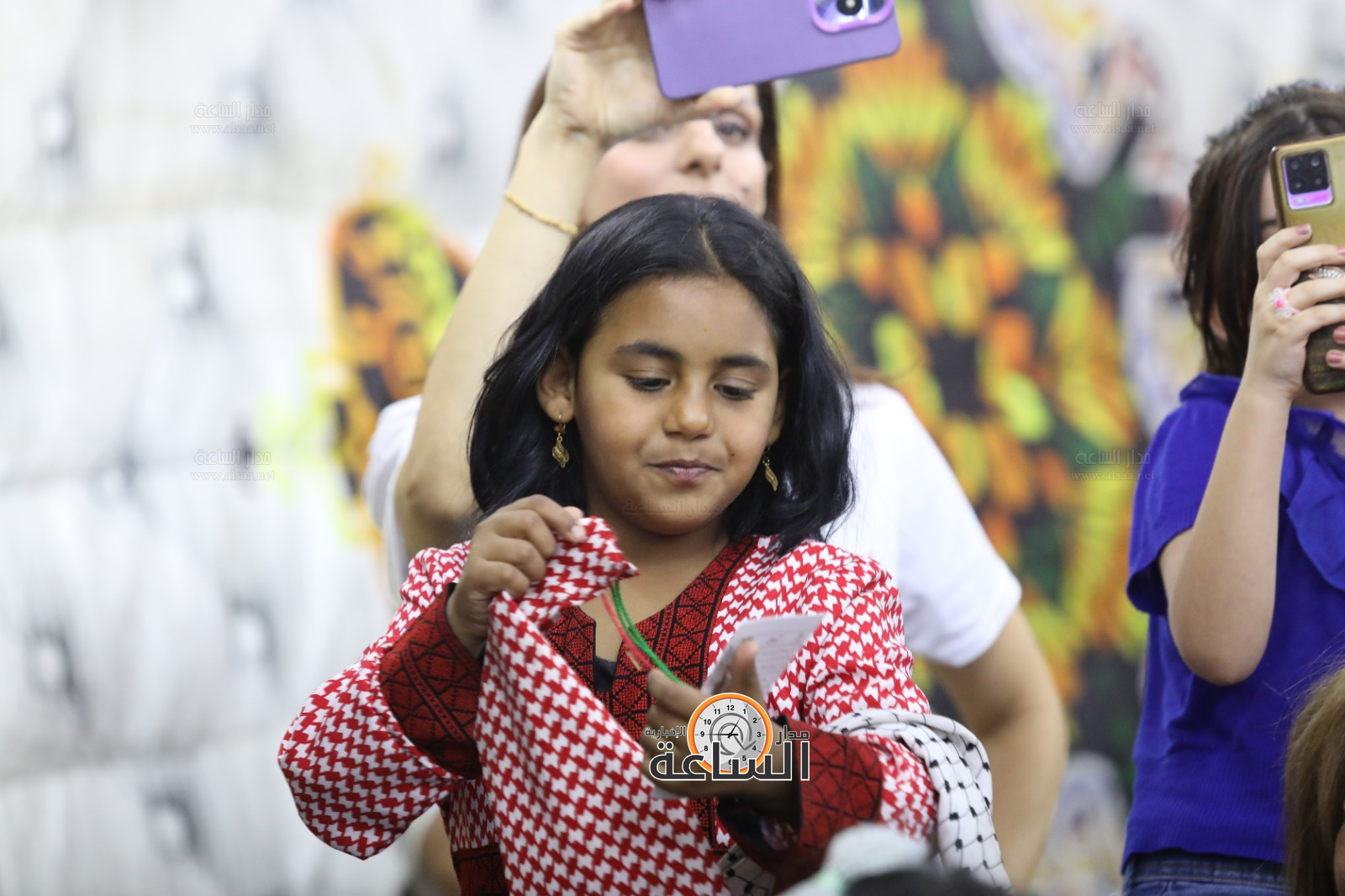 Madar Al-Saa Images 0.3846867595388157