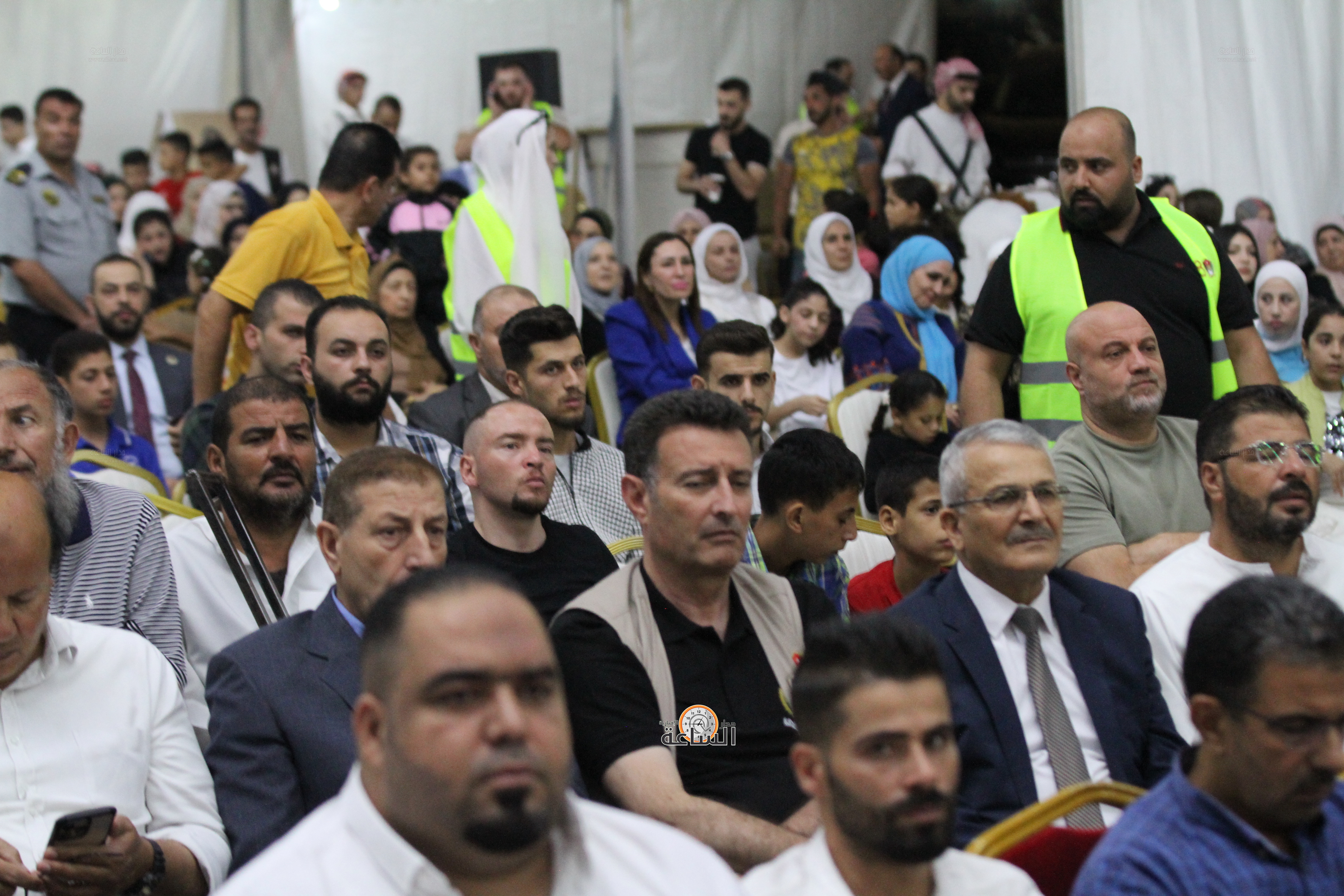 Madar Al-Saa Images 0.6906360476819944