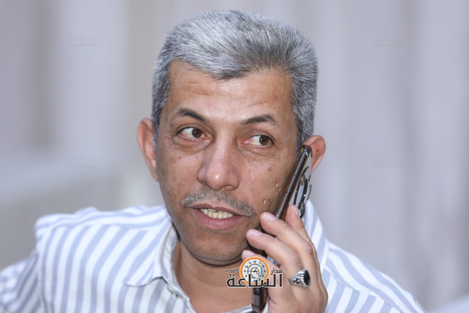 Madar Al-Saa Images 0.8595397645801632