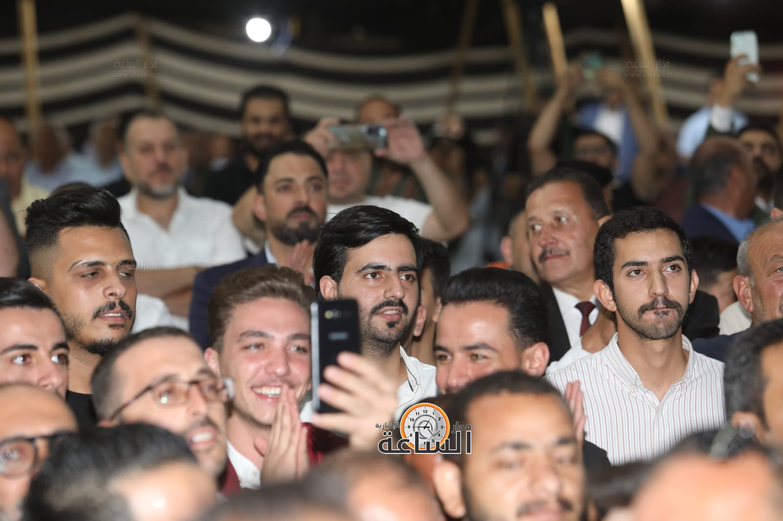 Madar Al-Saa Images 0.7763605552015655