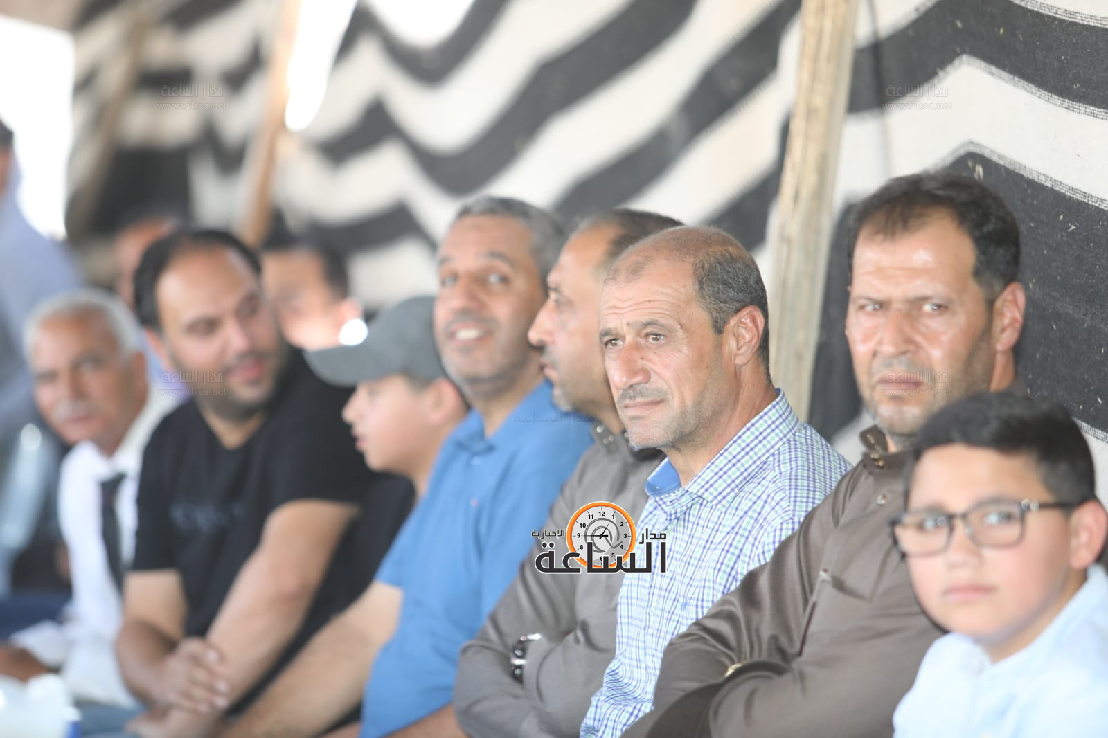 Madar Al-Saa Images 0.0587862599548028