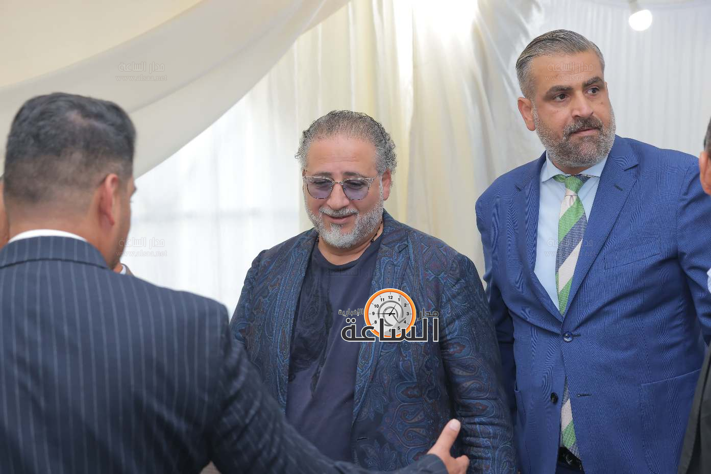 Madar Al-Saa Images 0.5954010596716439