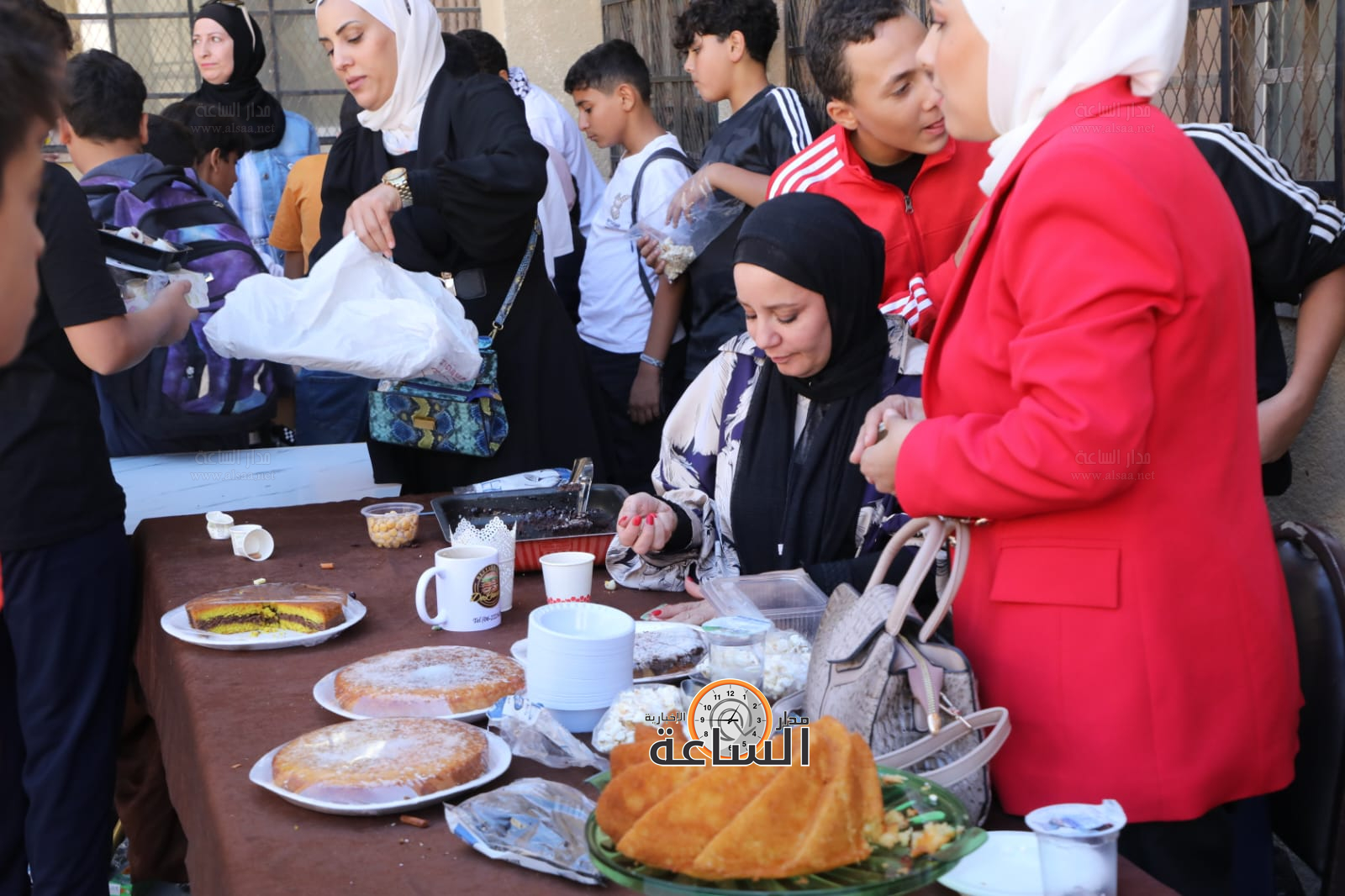 Madar Al-Saa Images 0.7700169044338947