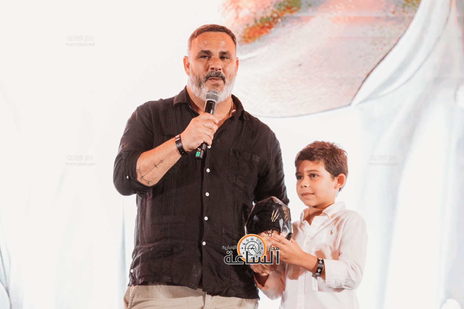 Madar Al-Saa Images 0.047035381119938435