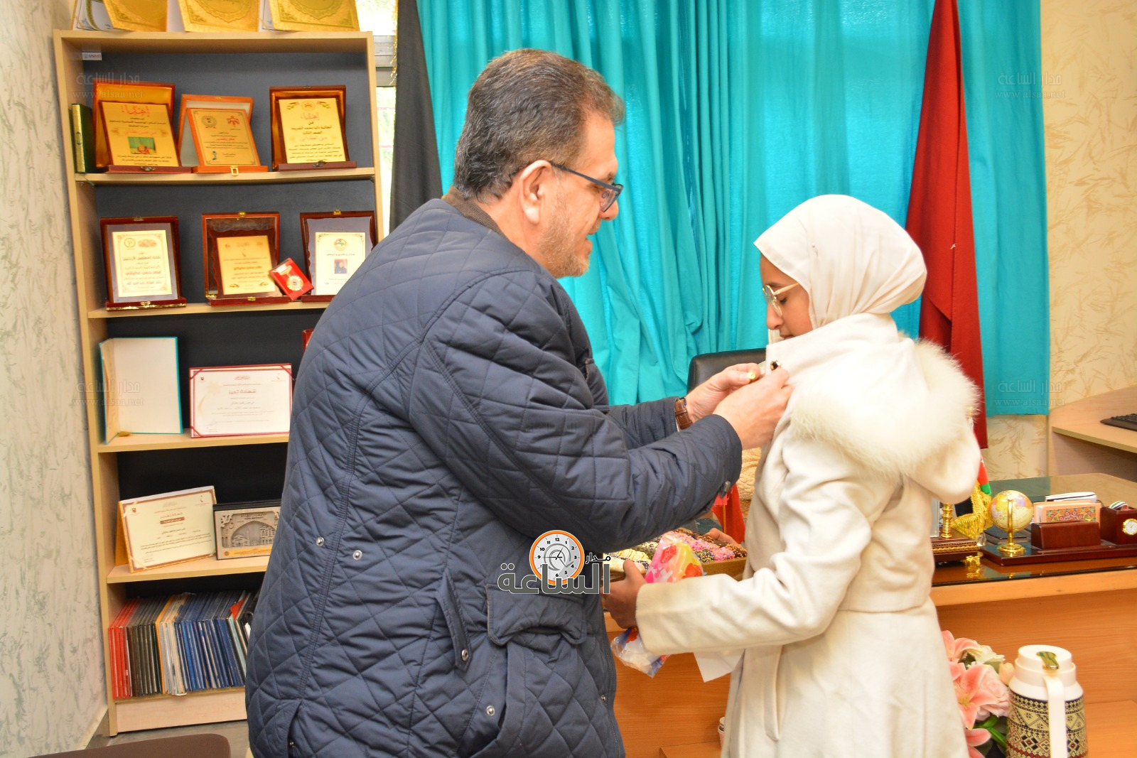 Madar Al-Saa Images 0.14877765499149342