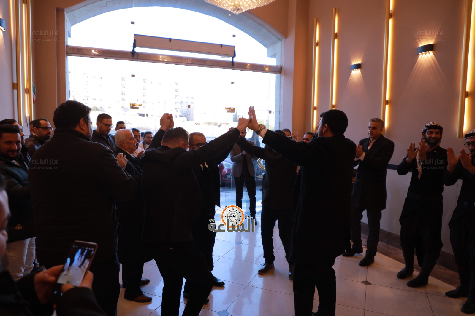 Madar Al-Saa Images 0.3272581549198643