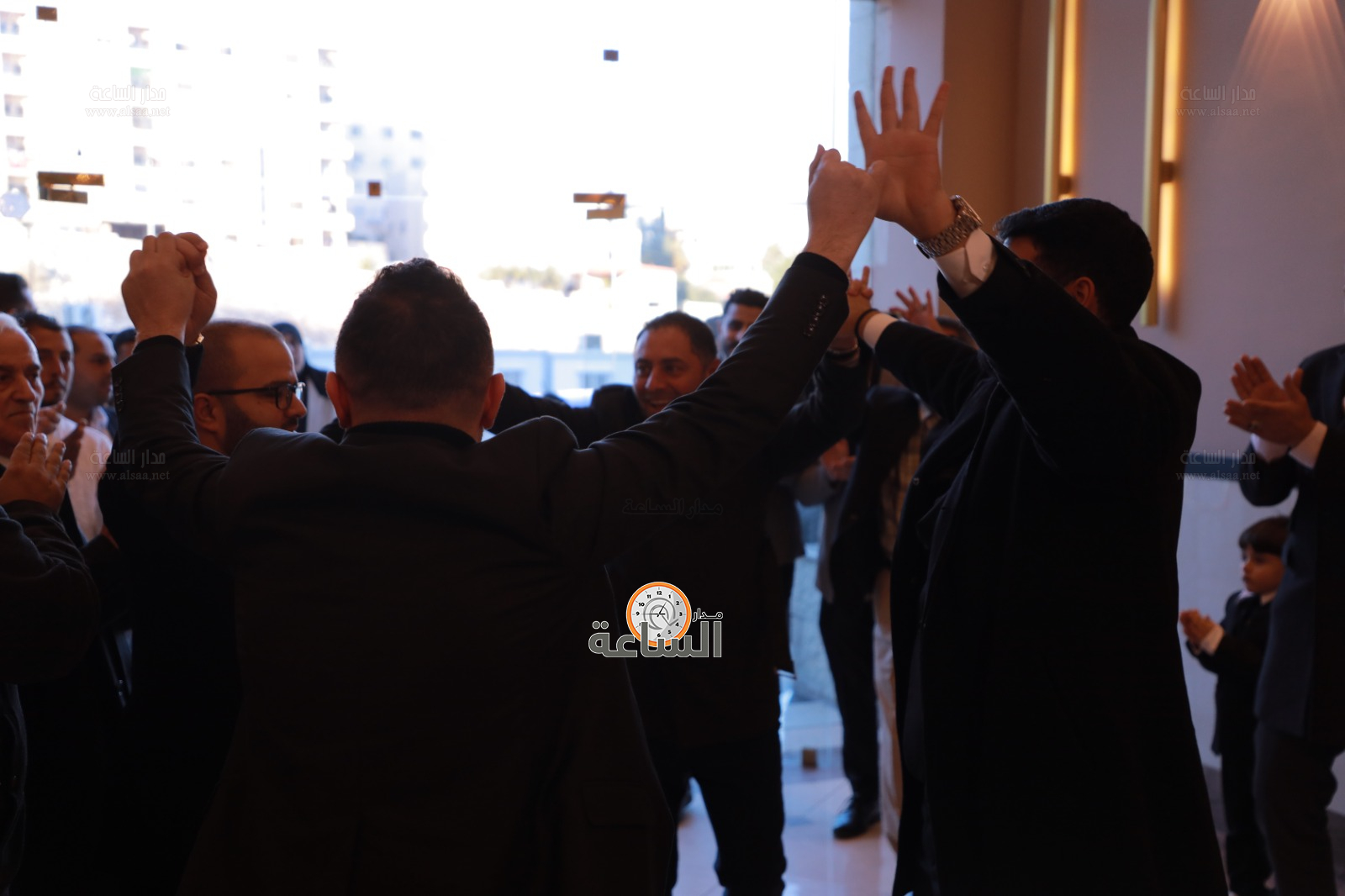 Madar Al-Saa Images 0.6336916317971917