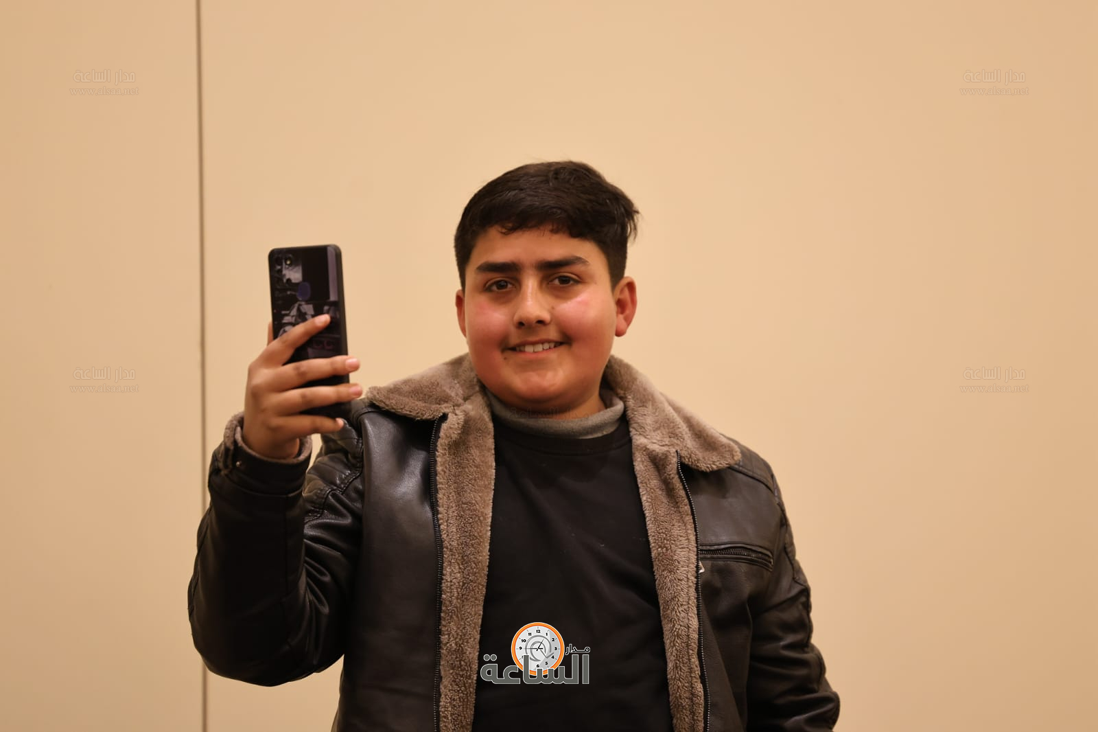 Madar Al-Saa Images 0.4374394352322646