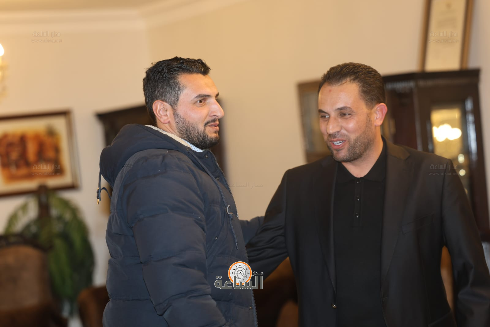 Madar Al-Saa Images 0.25000251895454073