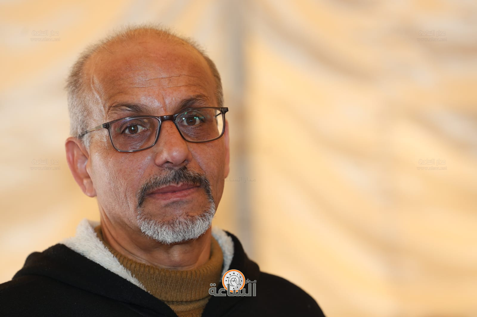 Madar Al-Saa Images 0.262678861792329