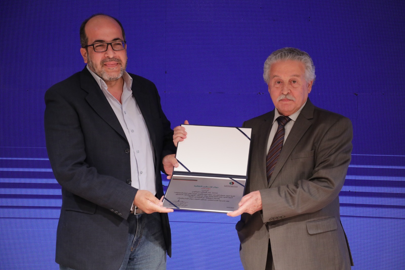 Madar Al-Saa Images 0.5986571163001787