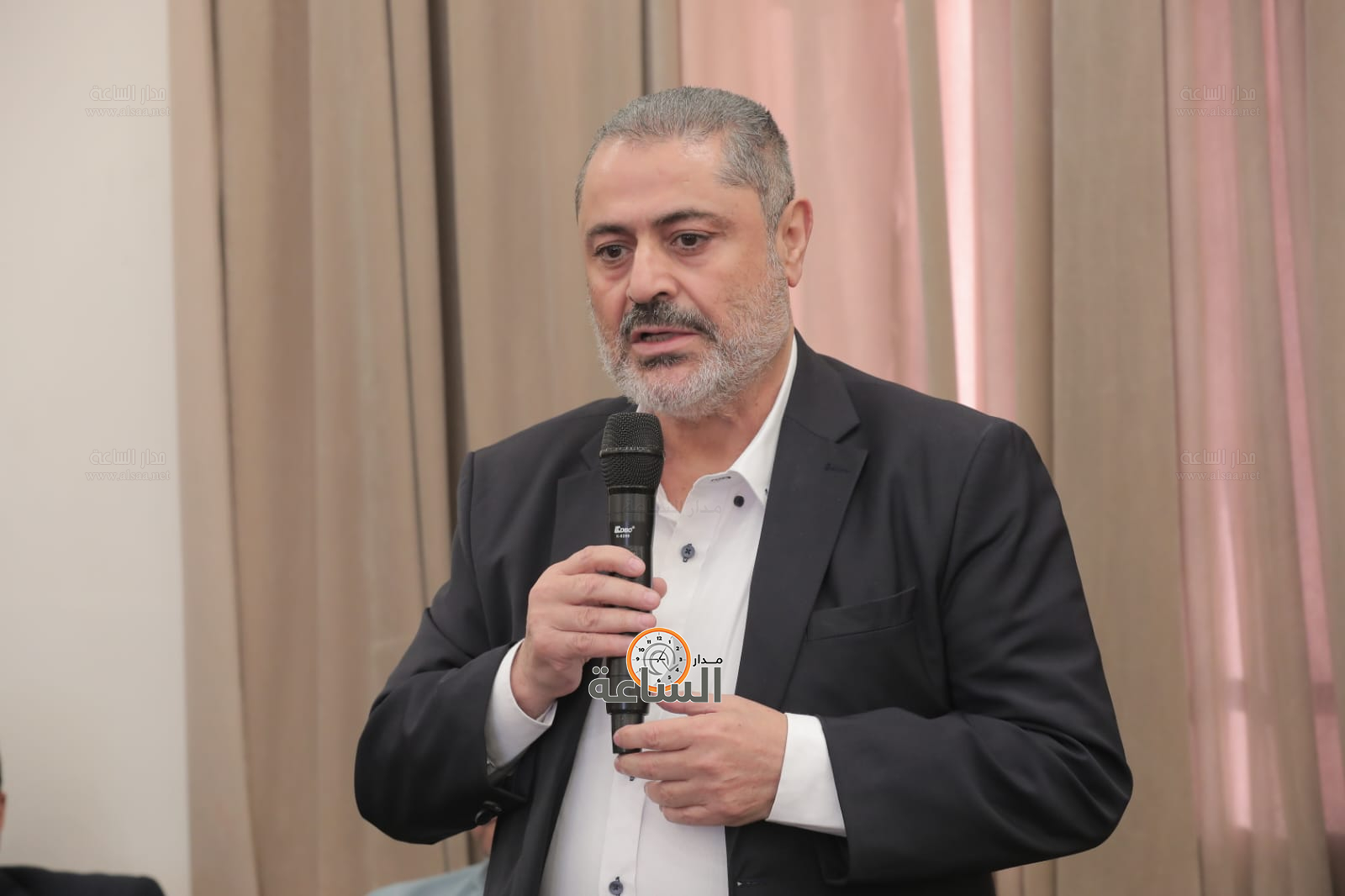 Madar Al-Saa Images 0.6002989308388909