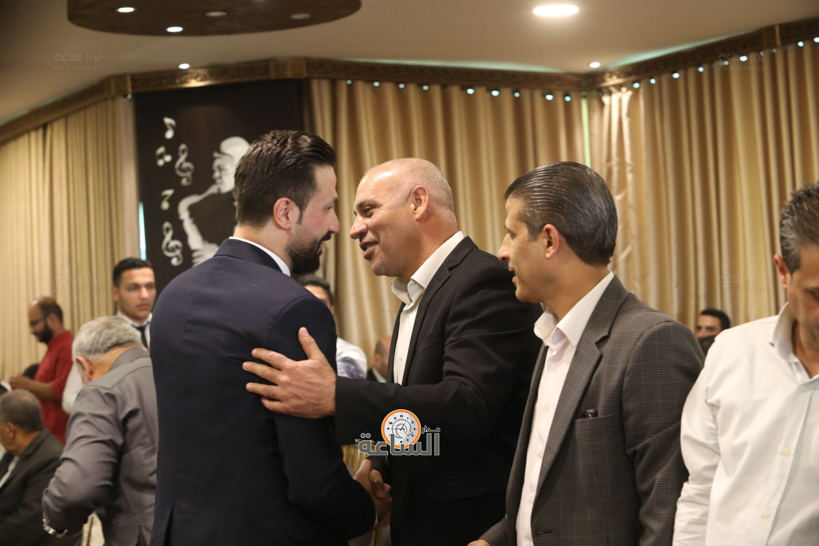 Madar Al-Saa Images 0.3556209243498125