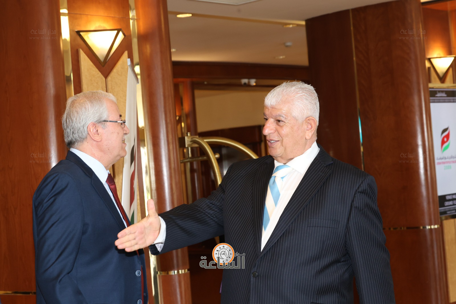 Madar Al-Saa Images 0.3013299965753439