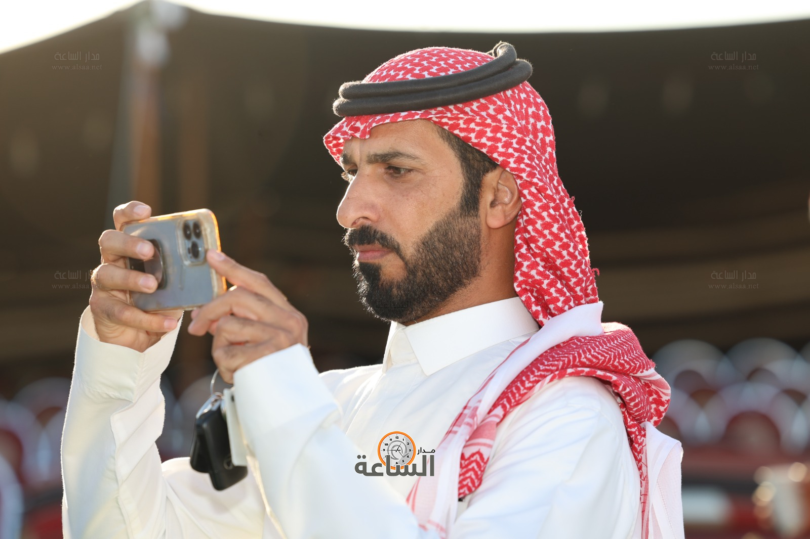 Madar Al-Saa Images 0.00481493761493712