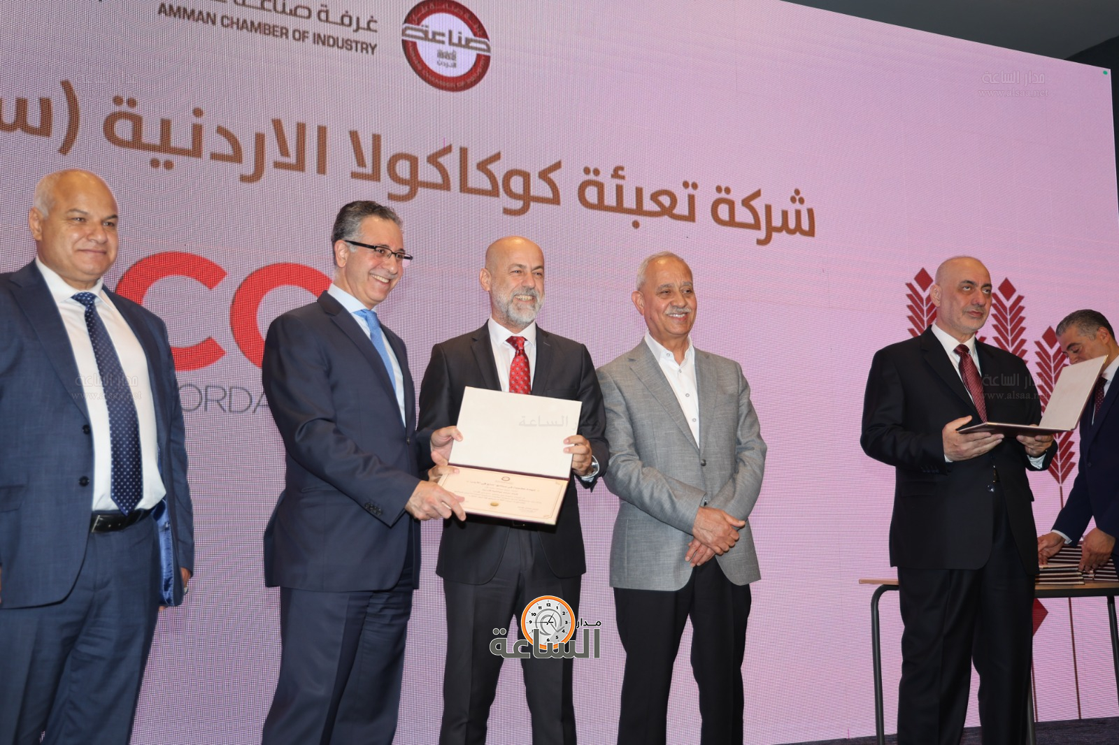 Madar Al-Saa Images 0.990632657068652