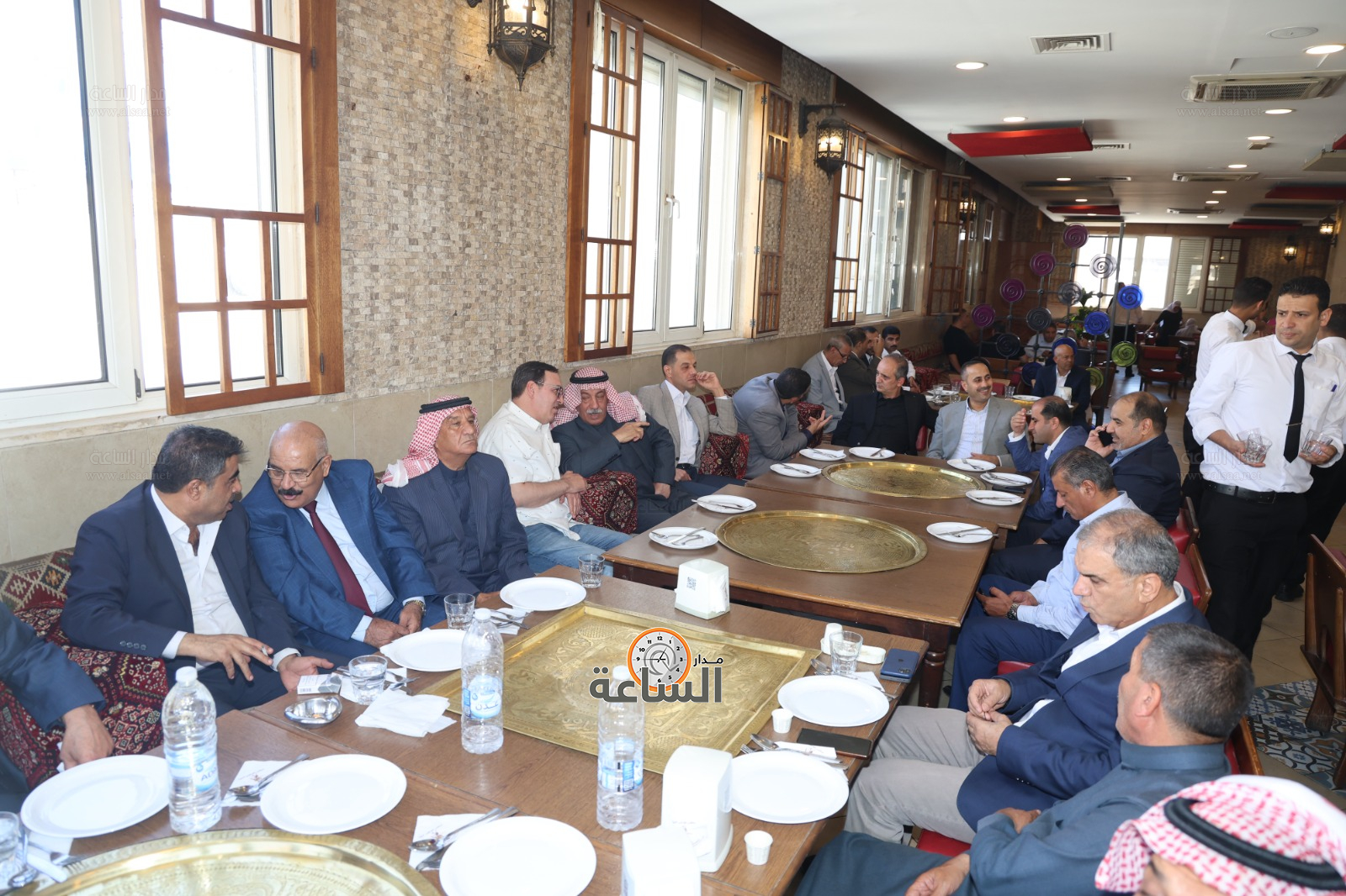 Madar Al-Saa Images 0.4423322032726035