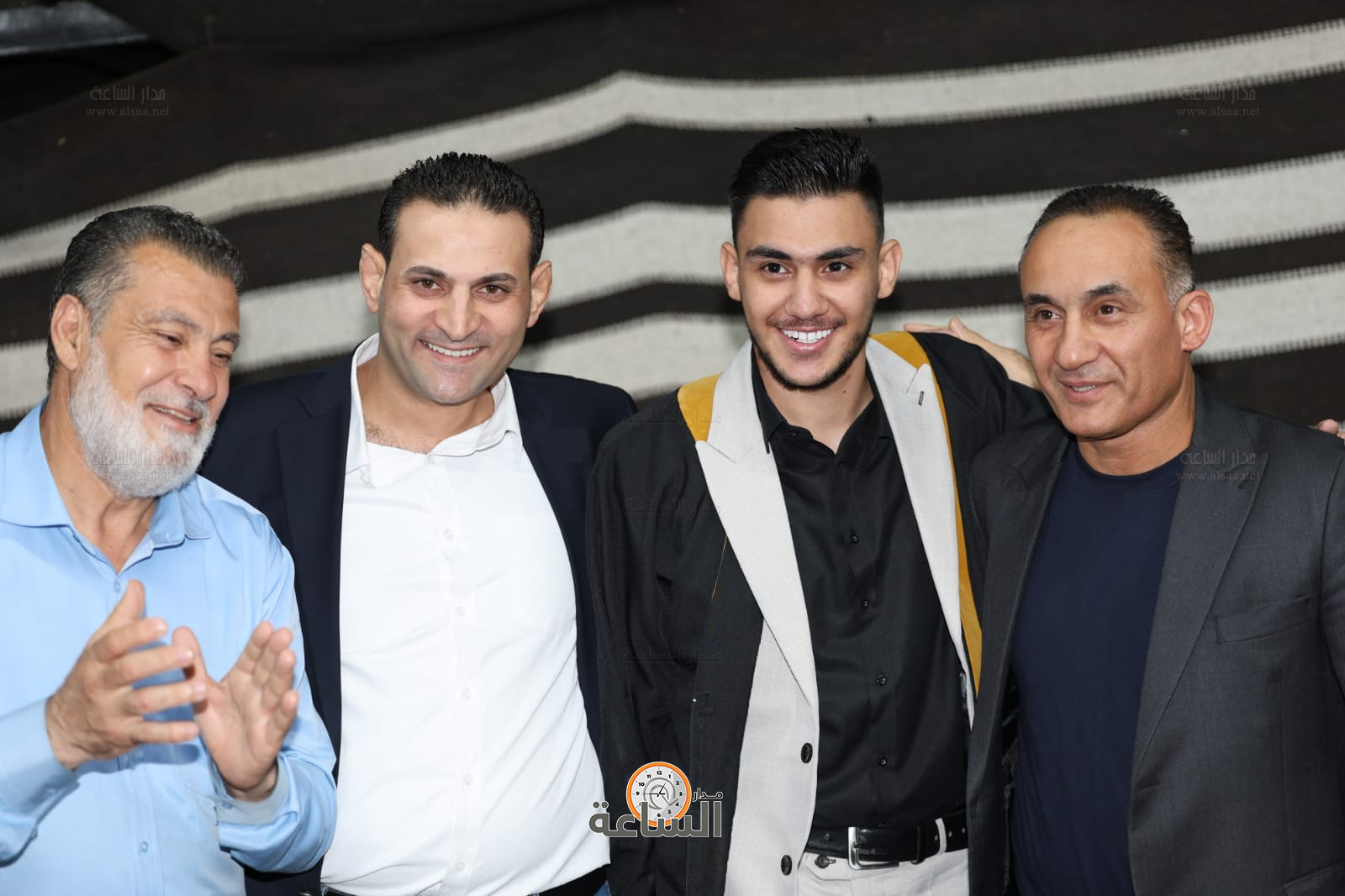 Madar Al-Saa Images 0.0038441054823344922