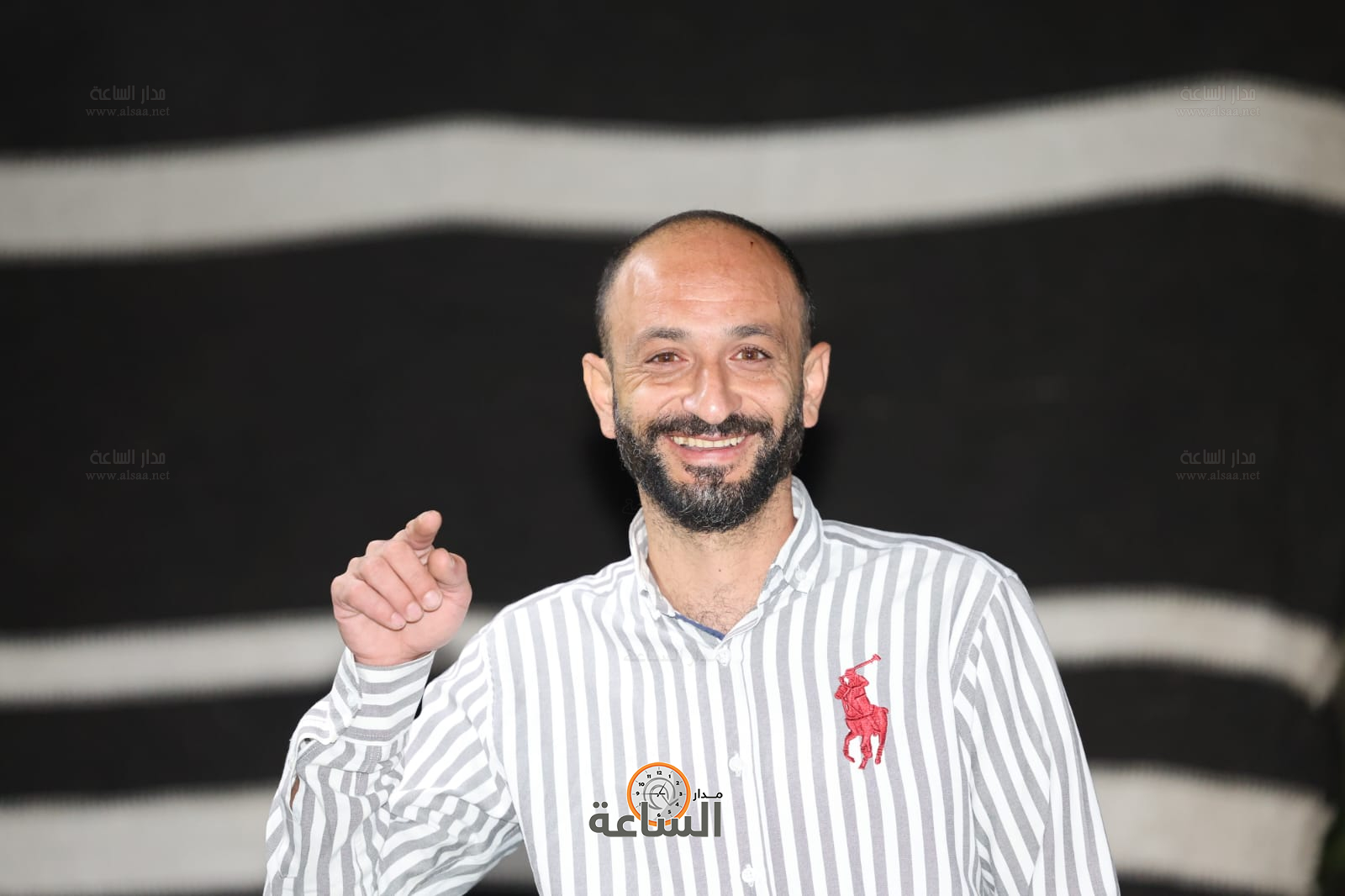 Madar Al-Saa Images 0.5963875336640895