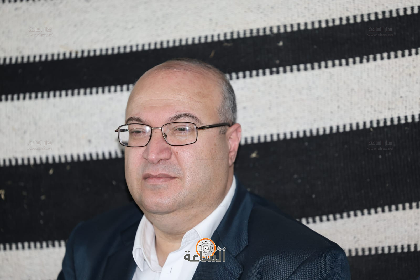 Madar Al-Saa Images 0.05858510465219191