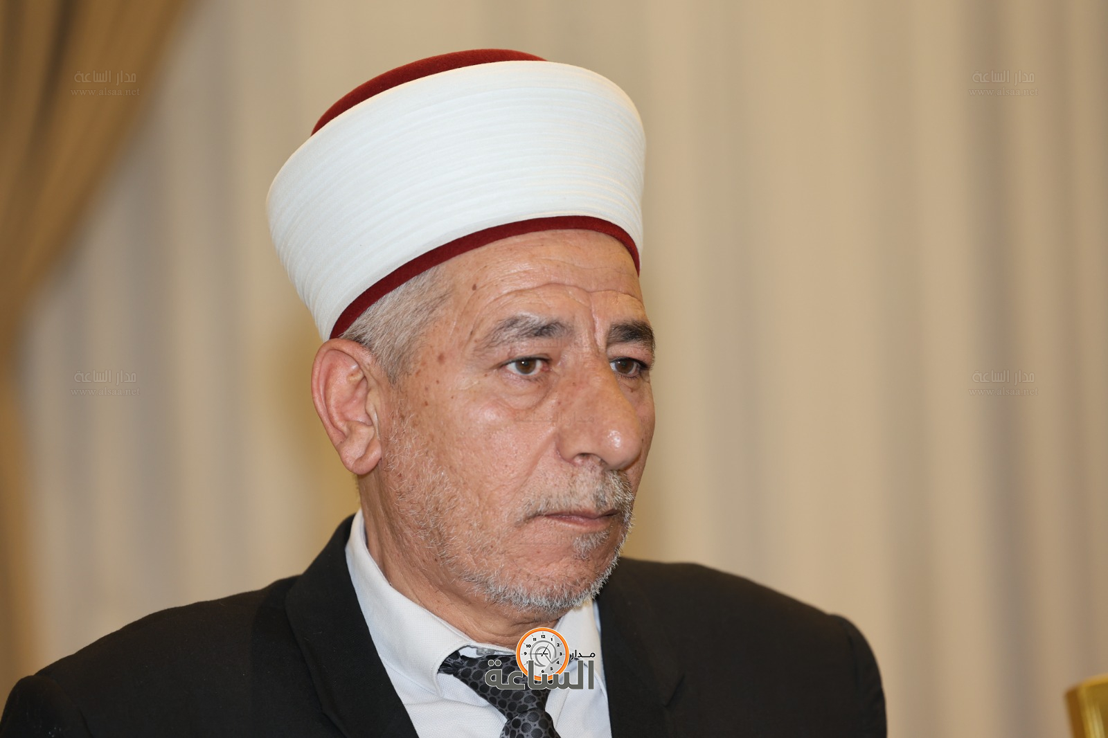 Madar Al-Saa Images 0.7000908580533015