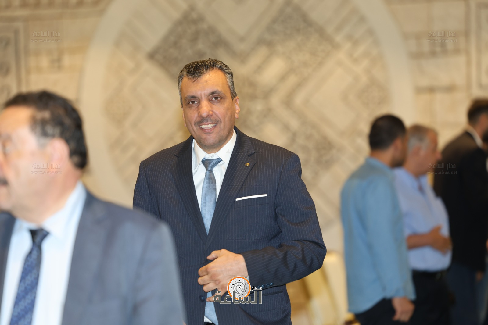 Madar Al-Saa Images 0.6192855392786613