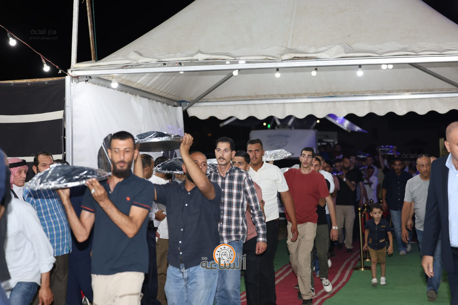 Madar Al-Saa Images 0.9244898758644451